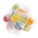 Clever Candy Wrapped Jelly Fruit Gems in individually sealed clear wrappers displaying their bright, translucent colors and sugar coating.