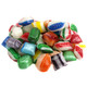 Close-up of vibrant red, green, and white satin Christmas hard candies with a glossy sheen