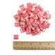 Close-up of red and white striped Atkinsons Maiden Kisses peppermint hard candies.