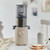 Hurom H310 Self-Feeding Mini Juicer in Beige