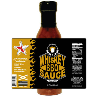 Image showcasing the Danny Cash bottle on a white background with a superimposed label, highlighting every aspect of the label design, presenting various elements of this vibrant and flavorful  Spicy Whiskey BBQ.