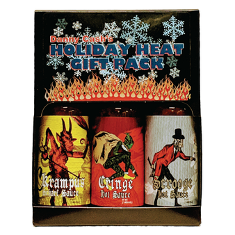 Image showcasing the Danny Cash Holiday Heat Naughty Gift Pack, presenting a trio of bold hot sauces adorned in festive holiday-themed packaging. Featuring Krampus Ghost Sriracha (Heat 10/10), Cringe Coconut Ghost (Heat 15/10), and Scrooge Scorpion Reaper (Heat 27/10), each sauce promises a daring and fiery flavor experience. Ideal for spicy food enthusiasts or those seeking a daring addition to their culinary adventures during the holiday season.