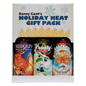 Image of the Danny Cash Holiday Heat Nice Gift Pack, featuring a holiday-themed set adorned with specially designed packaging. The gift pack includes three classic sauces: Rudolph the Red-Assed Reindeer Cajun Cayenne (Heat 4/10), Frosty's Demise Garlic Serrano (Heat 7/10), and Santa's Smokin' Chimney Red Habanero (Heat 10/10). Each sauce is dressed up for the festive season, promising diverse flavors and varying heat levels. The gift pack is an ideal present for flavor enthusiasts seeking a touch of heat during holiday feasts.