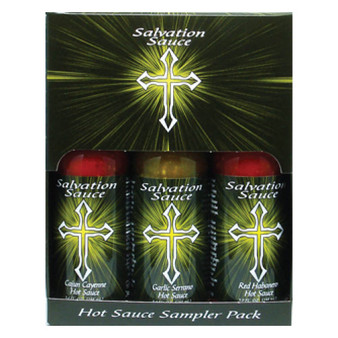 Image of the Salvation Sauce Hot Sauce Gift Pack featuring three distinct hot sauce bottles alongside a miniature Bible keychain. The gift box is adorned with Salvation Sauce branding, showcasing prominent biblical messages and themes, ideal for religious gifting or organizational purposes.