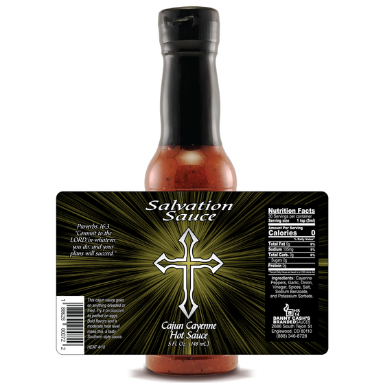 Salvation Sauce Cajun Cayenne Hot Sauce bottle showcases its divine label design, featuring rich biblical themes and a prominent Bible verse. The bottle stands boldly against a crisp white background, highlighting every captivating detail.