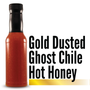 Image displaying the Branded Sauces' Gold Dusted Ghost Chile Hot Honey bottle against a white background, showcasing the product's vibrant color and featuring the product name in the image, but without a label. Image displaying the Branded Sauces' Gold Dusted Ghost Chile Hot Honey bottle against a white background, showcasing the product's vibrant color and featuring the product name in the image, but without a label.