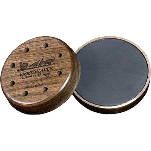 Woodhaven Legend Turkey Call Slate, round wooden hunting call with engraved woodgrain pattern and black soundboard for turkey hunting