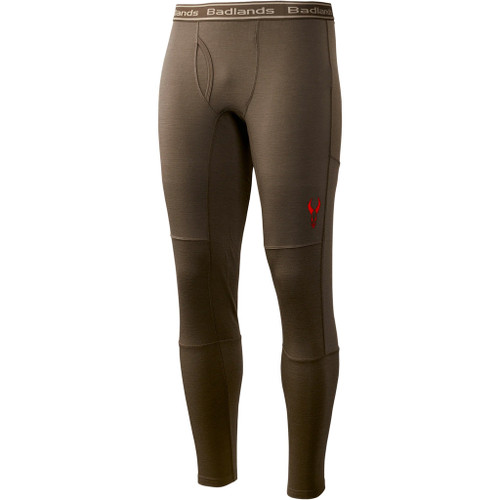 Badlands Pecora Heavyweight Merino Leggings Mud 2x-large, close-up image of brown heavyweight merino leggings with red logo, elastic waistband, and reinforced stitching for outdoor activities.