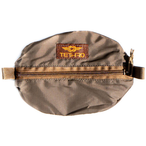 Tethrd Pulley Pouch Medium, compact carrying pouch with zipper closure and adjustable strap for outdoor gear organization.