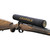 Leupold Scope Cover Large, black protective scope cover with gold logo, mounted on a wooden rifle with a scope.