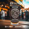 Custom engraved firefighter pint glass from JJDesignz featuring a detailed Maltese Cross and personalized with name and text. Highlighting the product&#39;s laser etching and dishwasher-safe qualities.