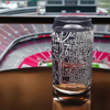 Custom laser-etched Columbus, OH map glass overlooking a stadium, capturing the intricate street layout around the Ohio State University area, perfect for Buckeye fans and alumni looking for a unique memorabilia piece.
