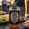 Custom-engraved Police Officer badge on a Libbey can glass, ideal for retirement or recognition gifts.