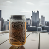 Laser-engraved Pittsburgh skyline map on 16 oz can glass, perfect for Pittsburgh lovers and collectors of city-themed drinkware.