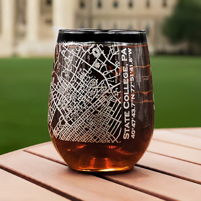 Stemless wine glass etched with a detailed map of State College, PA, prominently featuring the Penn State University area. Perfect for alumni or students seeking a personalized Penn State memento.