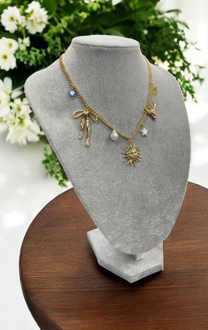 On Trend Gold Alloy Charm Necklace Sun Bow Cow Themed 