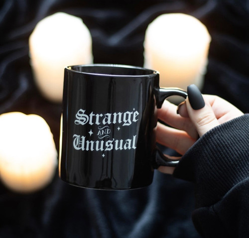 STRANGE AND UNUSUAL MUG