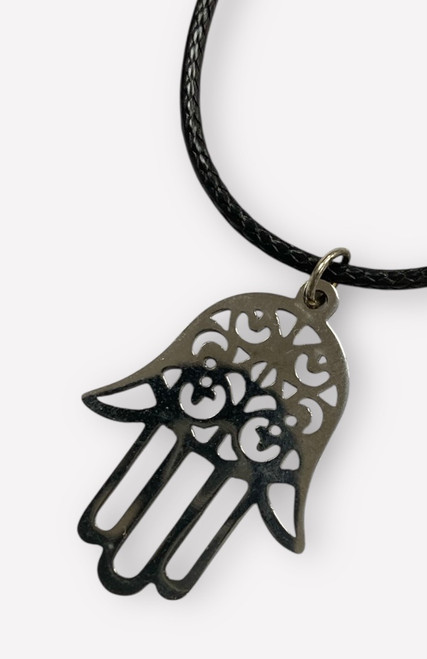 Stainless steel dark silver cut out Hamsa charm on black wax cord necklace Stainless steel dark silver cut out Hamsa charm on black wax cord necklace