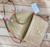 Shell & tasselled braid raffia sand straw bag with wristlet & crossbody strap - can be worn as crossbody bag or clutch