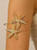 Starfish gold alloy hammered arm cuff