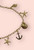 IBIZA CALLING Nautical Sea Theme Charm Gold Necklace - Starfish Shell & Anchor