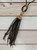 Black & gold statement Chinese knot & tassel cable necklace