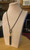 Black & gold statement Chinese knot & tassel cable necklace