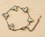 Designer inspired gold stainless steel butterfly bracelet with off white pearl effect centres