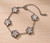 Designer inspired silver stainless steel clover bracelet with white centres