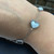 Designer inspired silver stainless steel leaf, heart, butterfly &clover bracelet with white centres