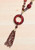 Statement lagenlook long necklace in reds with multi bead & charm chain & disc tassel pendant (style 87)