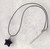Amethyst polished star pendant necklace on black cord