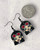 Black alloy metal enamelled Nico Robin inspired charms on black alloy ear wires 