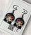 Black alloy metal enamelled Nico Robin inspired charms on black alloy ear wires 