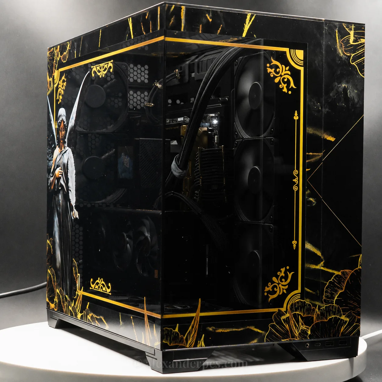 Custom build in obsidian glass with hand-painted gold filigree and a statue