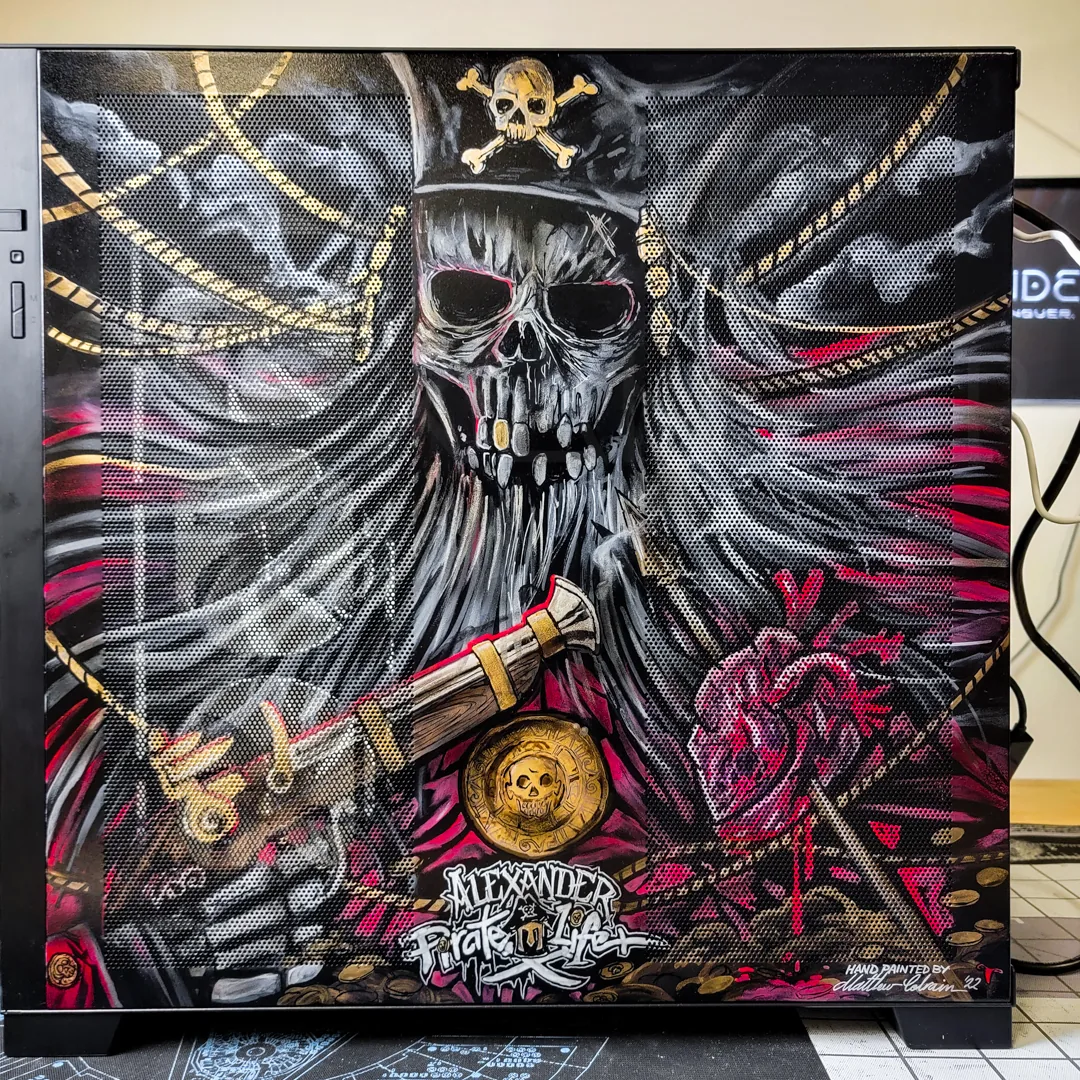 Hand-painted pirate skull custom build artwork in red and gold