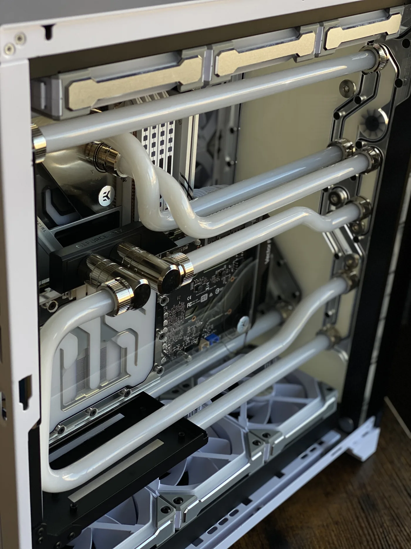 White hardline water-cooled custom build with mirror-polished fittings