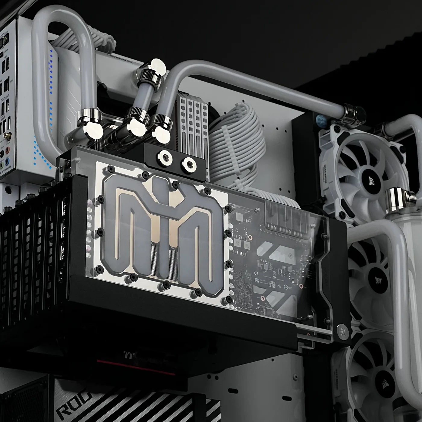 White hardline loop with a custom-engraved GPU waterblock