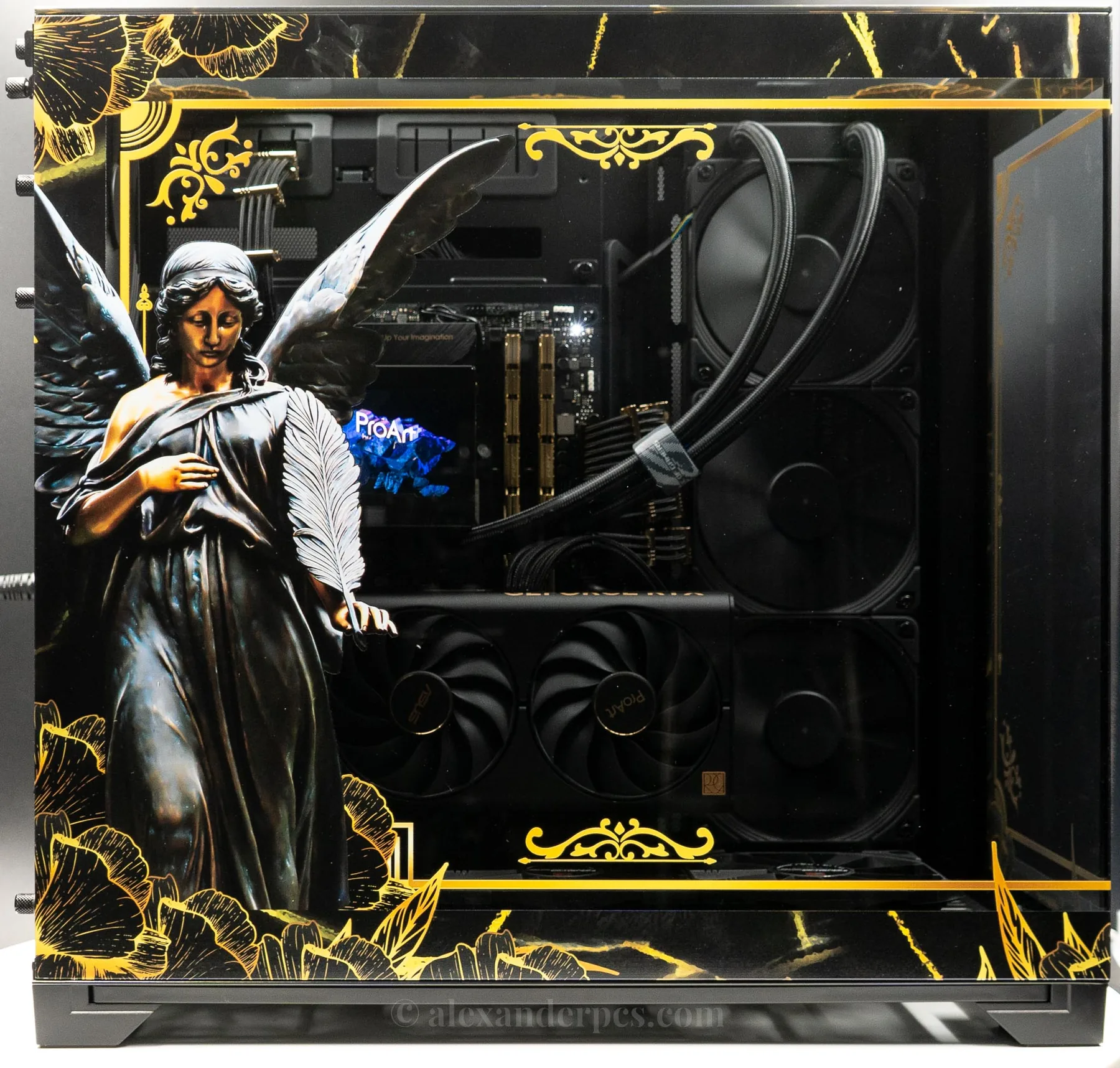 Alexander PCs one-of-one build in black marbled glass with a bronze angel statue and hand-painted gold filigree