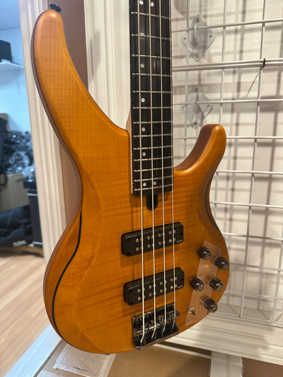 Yamaha TRBX604FM Matte Amber 4 string electric bass guitar display