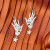 Fluff Hardware Clairvoyant Hand Earrings