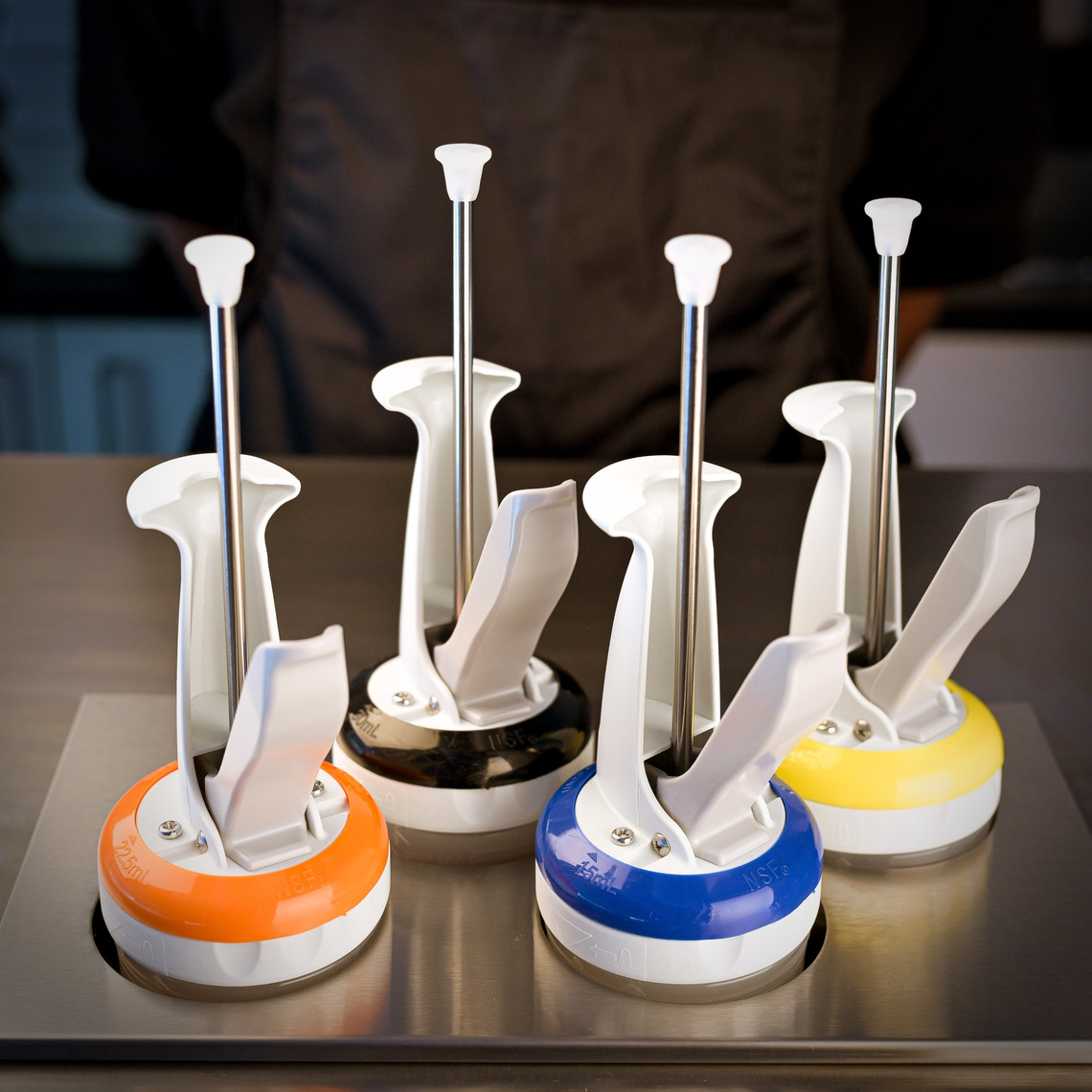 Four Portion Pals sitting in a Portion Pal organizer for 1/3 insert