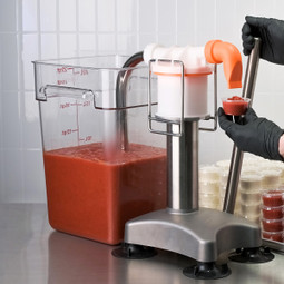 FIFO Fill Station™ drawing sauce directly from a bulk sauce container