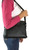 Small Multi-Pocket Crossbody Bag on model. Side POV. Color: Black