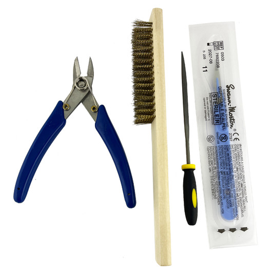 Casting Accessories Took Kit: Snipper, Brush, File and Scalpel.