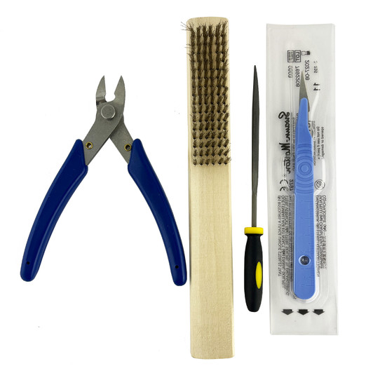 Casting Accessories Took Kit: Snipper, Brush, File and Scalpel.