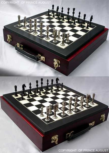 Staunton chess set after being cast and one side polished and the other painted black. Board sold separately. Display case unavailable.