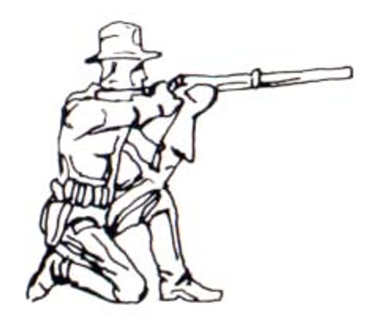 Cowboy kneeling firing gun