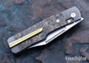Jack Wolf Knives: Gunslinger Jack - Titanium Framelock - Dark Matter Gold Fat Carbon - CPM-S90V - Hand Satin Finish