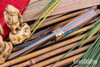 Bark River Knives: Kitsune Tanto - CPM 154 - Brass Bolster - Red Texas Fencepost - White Liners